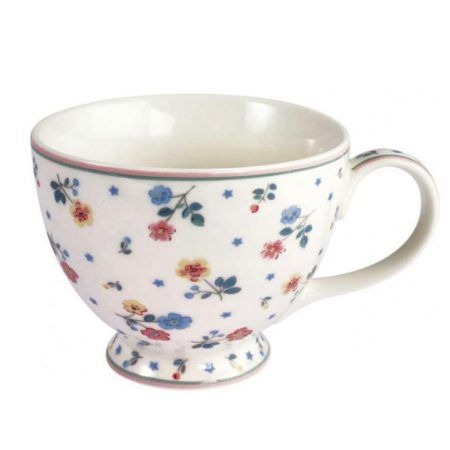 La tassa gran “teacup” ADELENA White de GreenGate és novetat en la col.lecció de Tardor-Hivern’2023. El seu estampat amb petites flors de color blau, rosa, gris, verd en diferents tons fan que sigui molt original. També hi ha flors amb un toc de color groc, això fa que aquesta tassa gran es pugui combinar amb tota la col.lecció Alice Everyday de GreenGate fent que cadascú pugui crear el seu propi joc de te. En la galeria de fotos pots veure altres articles amb aquest estampat Adelena White com plats, la tetera, tasses, mugs, bowls, tea towels, estovalles, tovallons. Com que és de porcelana gruixuda, ajuda a mantenir durant més temps a temperatura del te i cafè. Vols veure les altres tasses teacup de GreenGate que tenim a INHALA? Clica aquí! Ideal per servir tes, infusions, cafè i també, una bona xocolata calenta. A INHALA Cafès i Tes som punt de venda de GreenGate, firma danesa molt exclusiva. Estem a Portalet, 9 de Granollers, Barcelona. T’esperem!